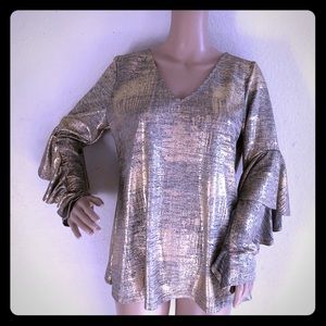 A metallic blouse by Gibson & Latimet.